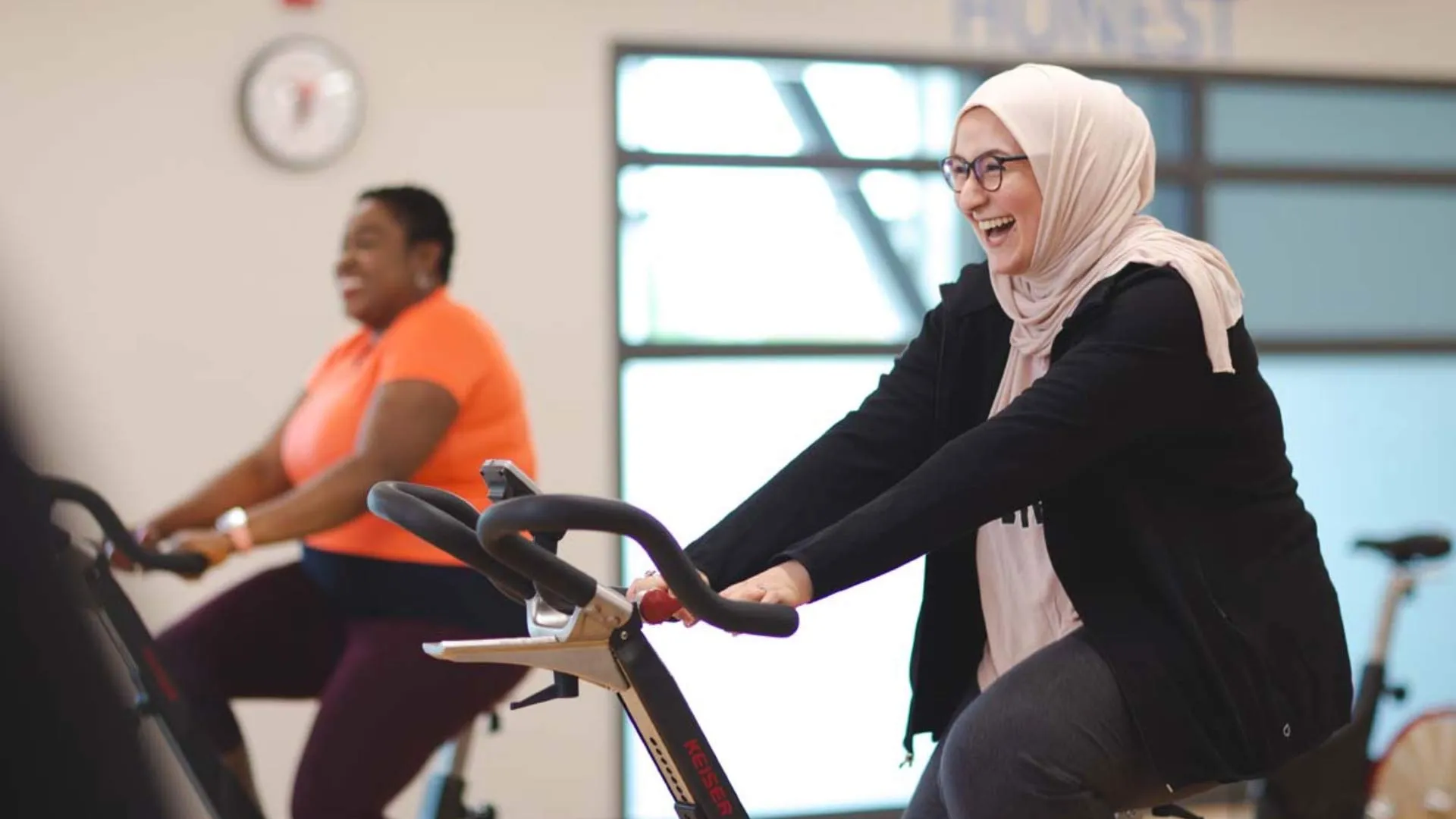 Two women participating in a free program for immigrants and newcomers