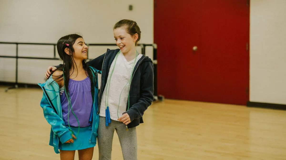 Two children participating in a child, youth, and family program at the Langara Family YMCA