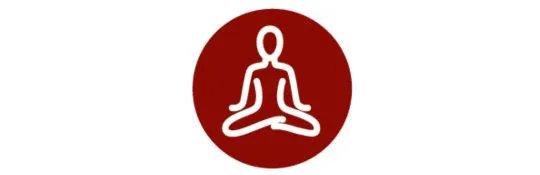 An icon depicting an individual engaged in meditation