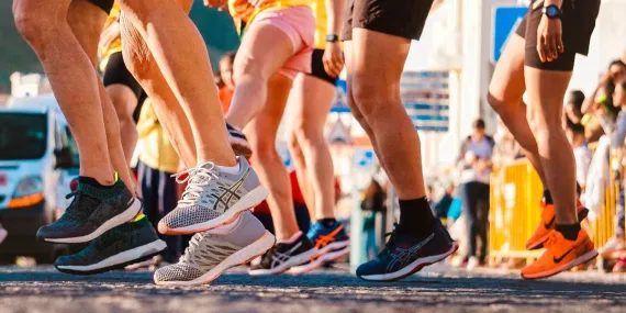 A view of runners' feet as they warm up for the BMO Vancouver Marathon